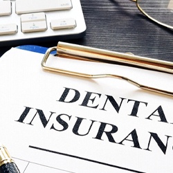 Dental insurance paperwork in Marion