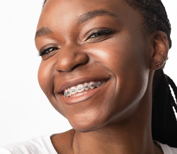 Teen girl with braces smiling