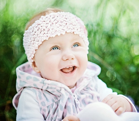 Baby laughing after frenectomy