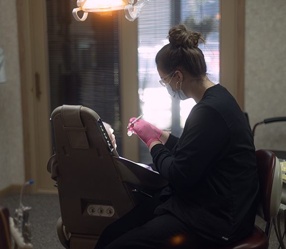 Patient smiling during dental checkup