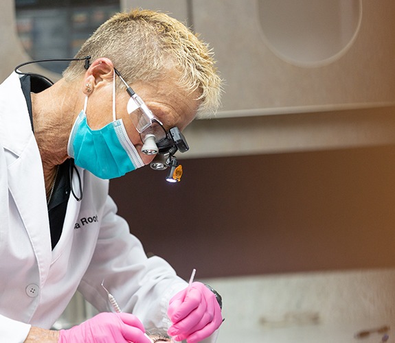 Patient receiving professional teeth cleaning