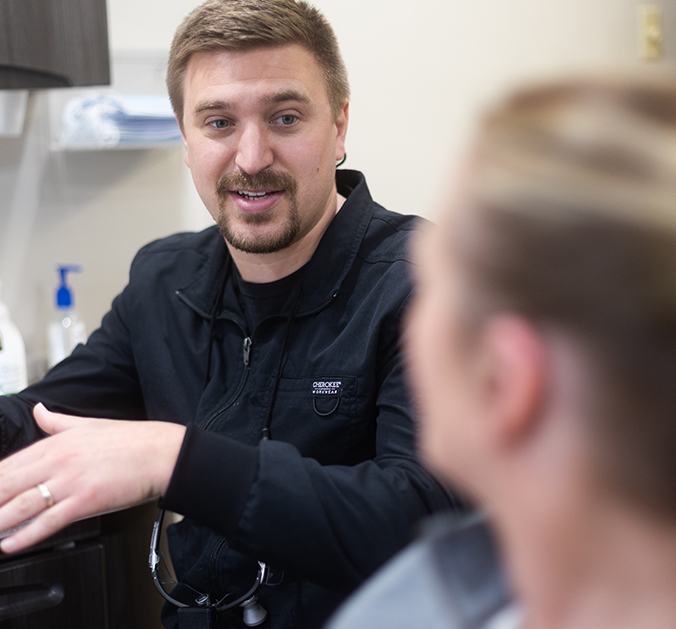 Woman showing offer her smile after cosmetic dentistry