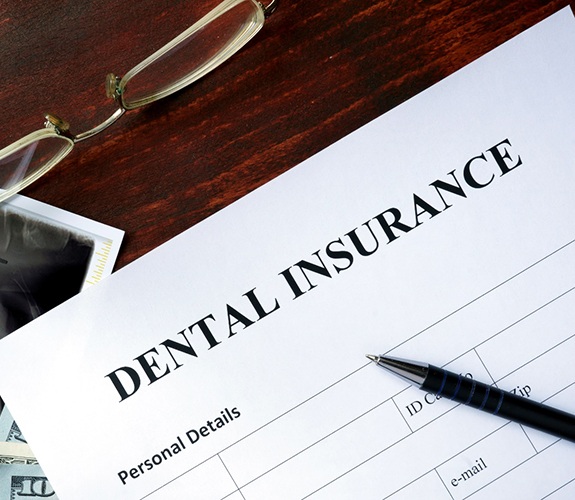 dental insurance form on table 