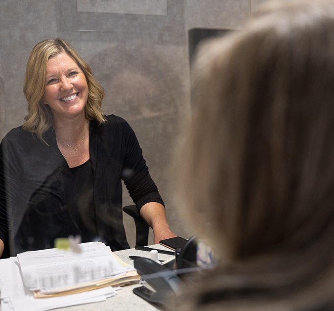 Two women sharing healthy smiles