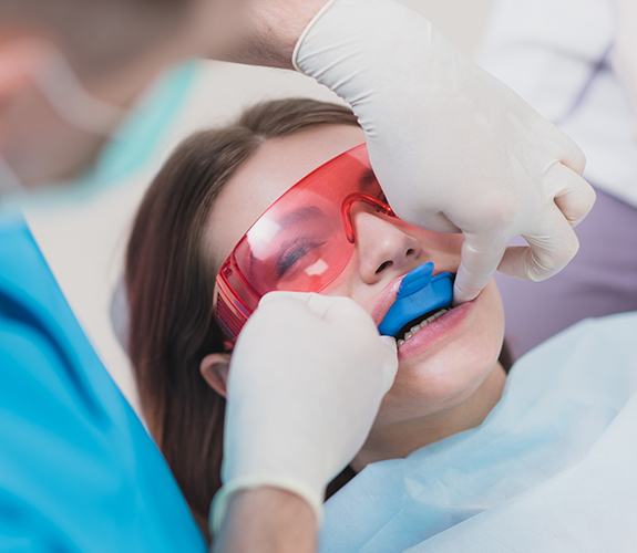 Patient receiving fluoride treatment