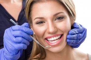 woman happy dental visit