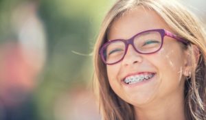 Smiling girl with braces