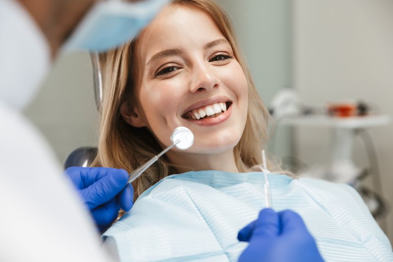 Woman smiling at dentist appointment