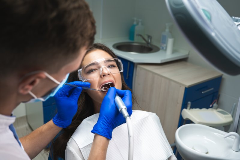 dentist performing root canal